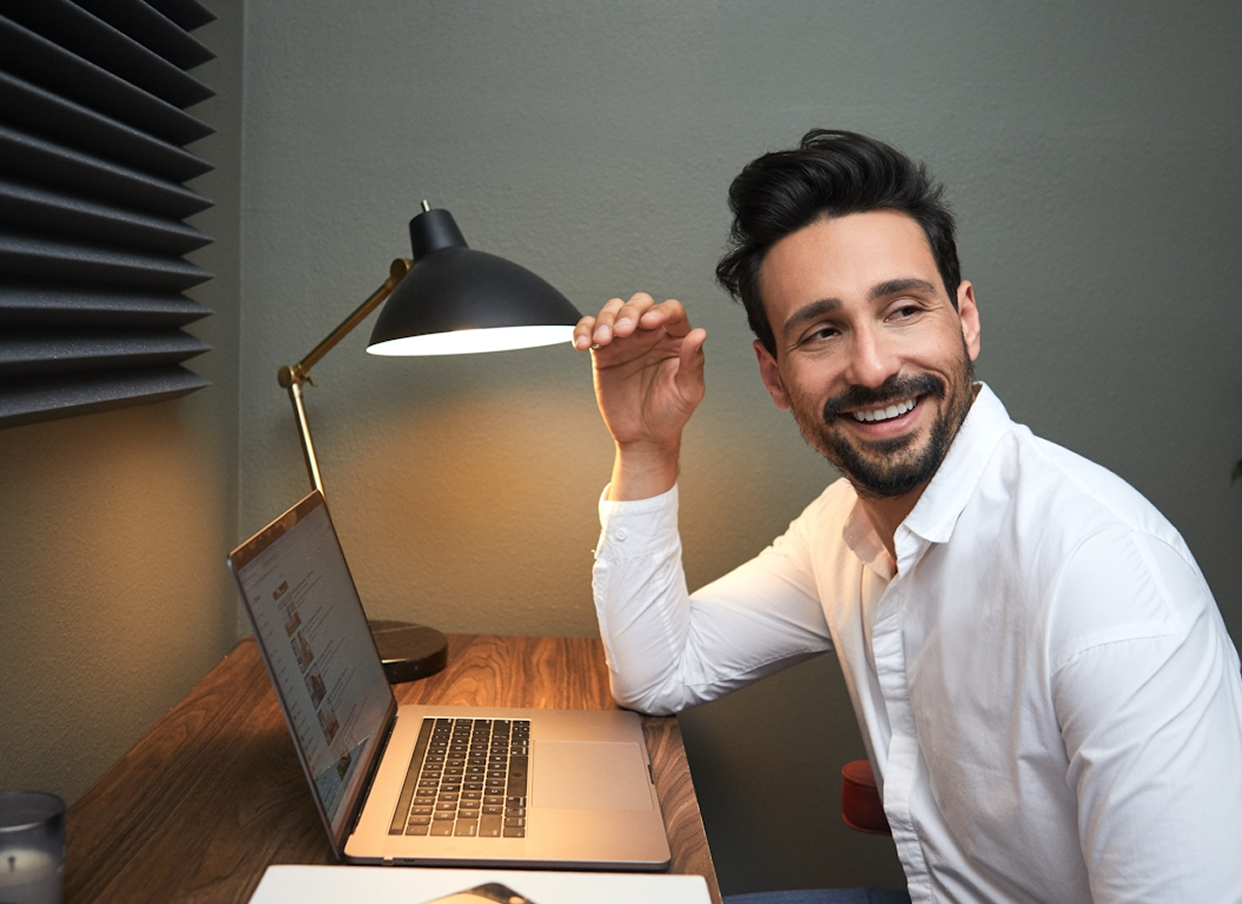 Man focused at computer, representing focus and mood